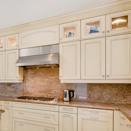 Sample photo: painted kitchen cabinets with glass-front uppers.